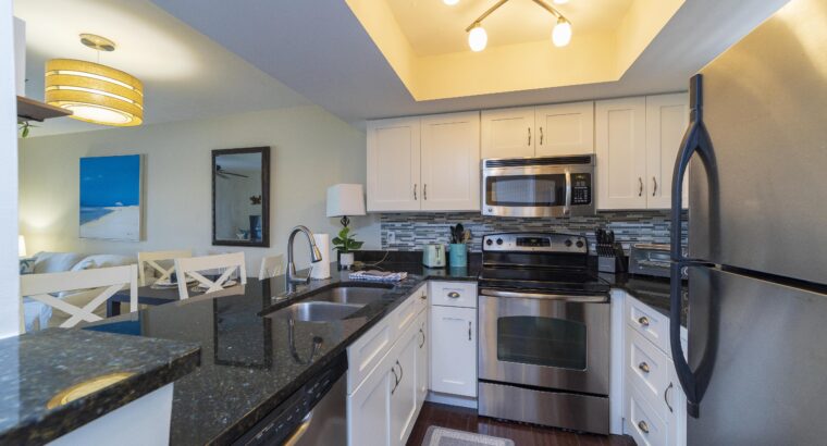 Newley Remolded Ground Floor Condo ~ Heated Pool ~ Pet Friendly