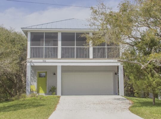 Newer Home with Screened Balcony ~ Pet Friendly ~ Steps to the Ocean!
