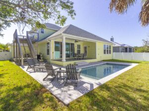 New Home  ~ Heated Pool ~ Professionally Decorated ~ Steps to the Beach!!!